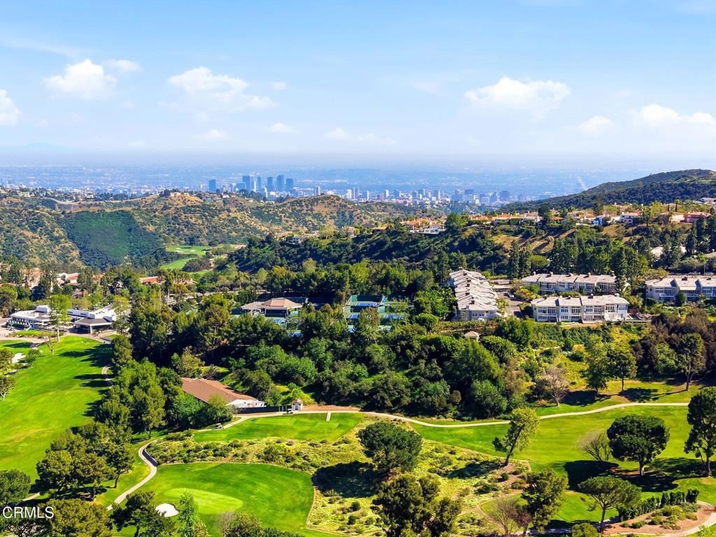 2317 Canyonback Road Los Angeles, CA 90049 - Photo 70 of 72 an aerial view of residential houses with outdoor space and trees
