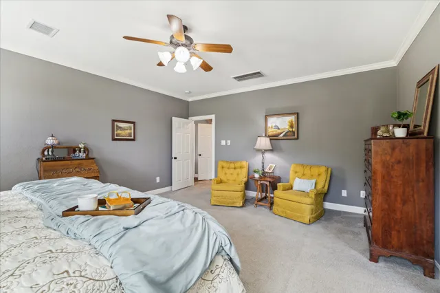 a bedroom with a bed and furniture