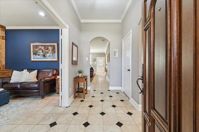 a living room with furniture and a gate