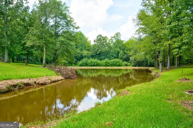 a view of a lake with a big yard