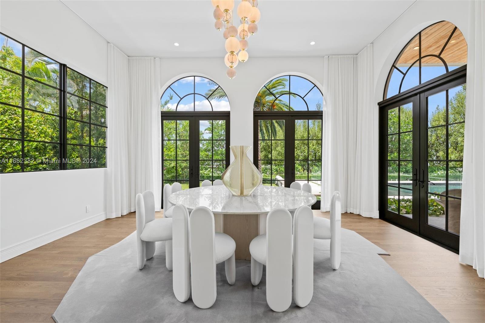 406 Tamarind Drive Hallandale Beach, FL 33009 - Photo 14 of 37 a dining room with furniture outdoor and garden view