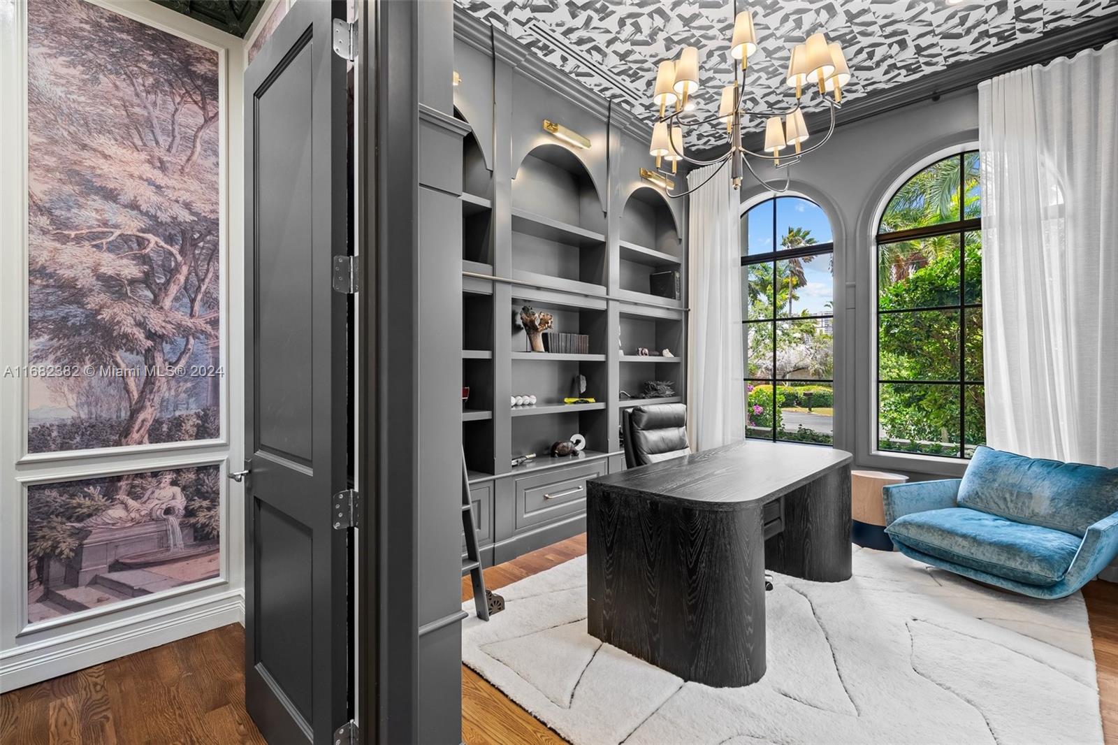 406 Tamarind Drive Hallandale Beach, FL 33009 - Photo 15 of 37 a dining room with glass door and furniture