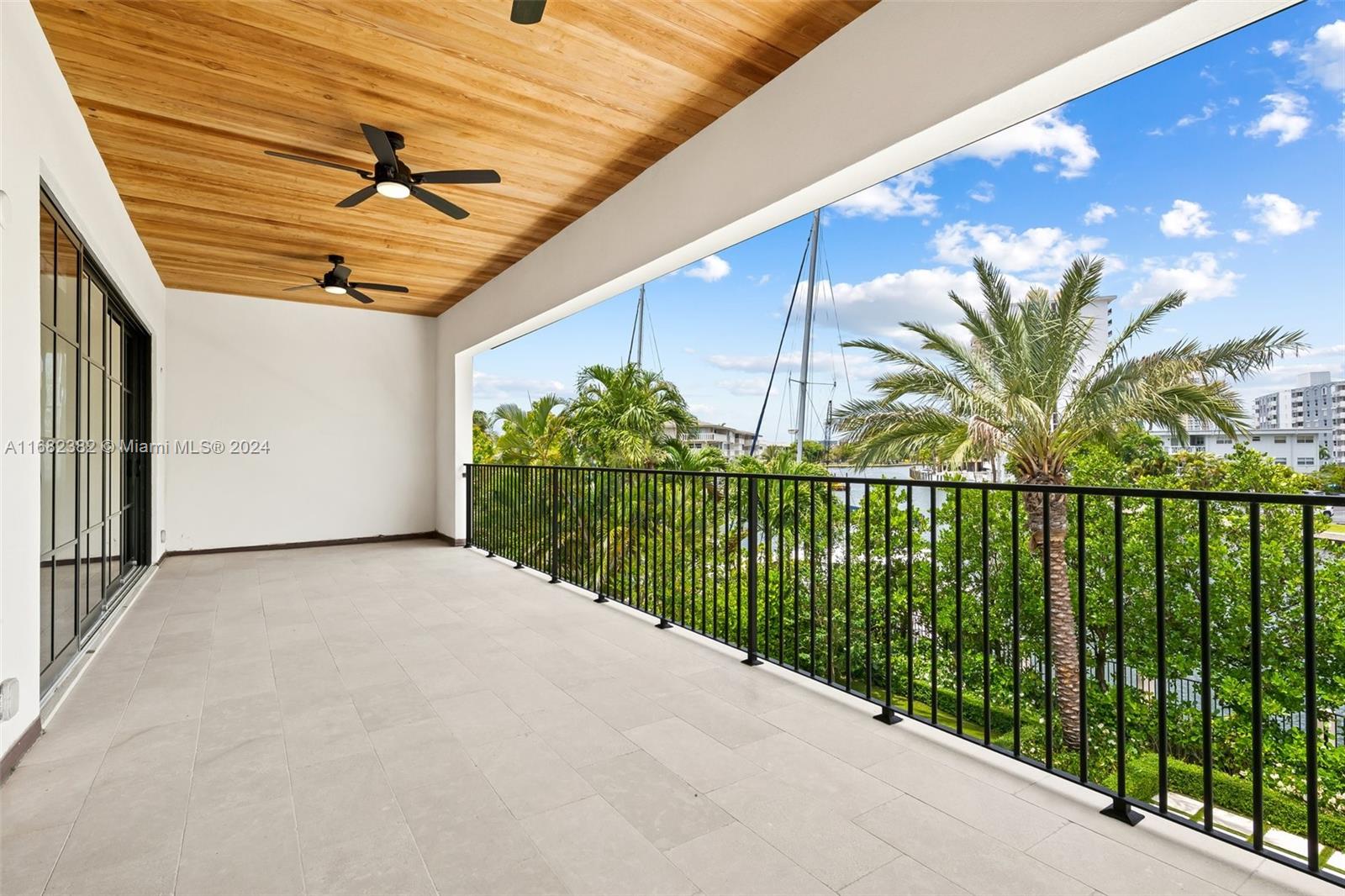 406 Tamarind Drive Hallandale Beach, FL 33009 - Photo 23 of 37 a view of a balcony with window