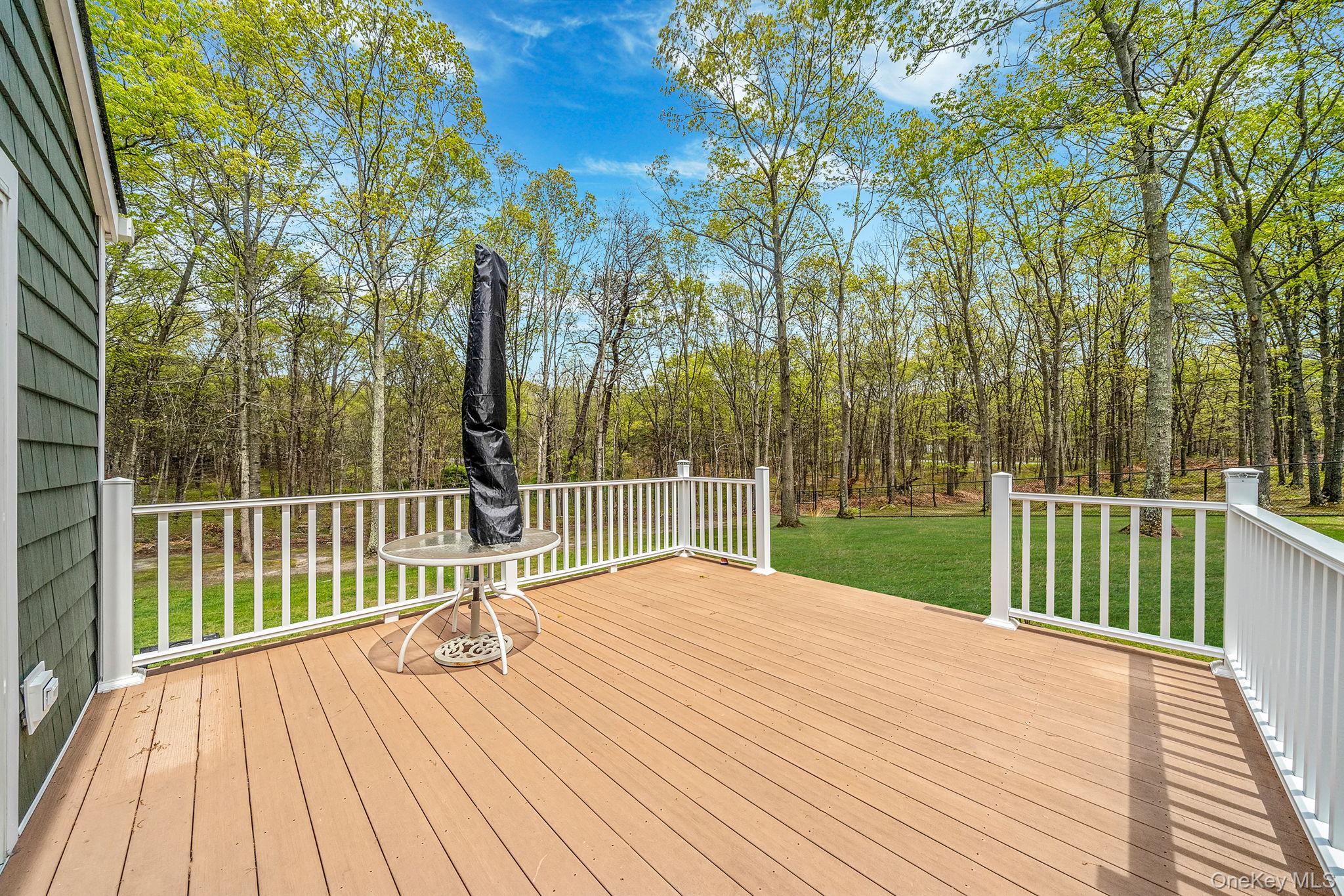 14 Belvoir Court Ridge, NY 11961 - Photo 9 of 22 primary bedroom deck