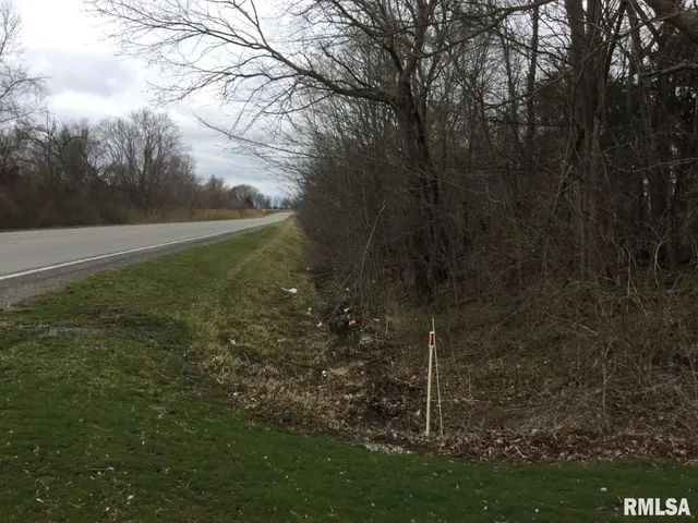 a view of a golf course with a big yard