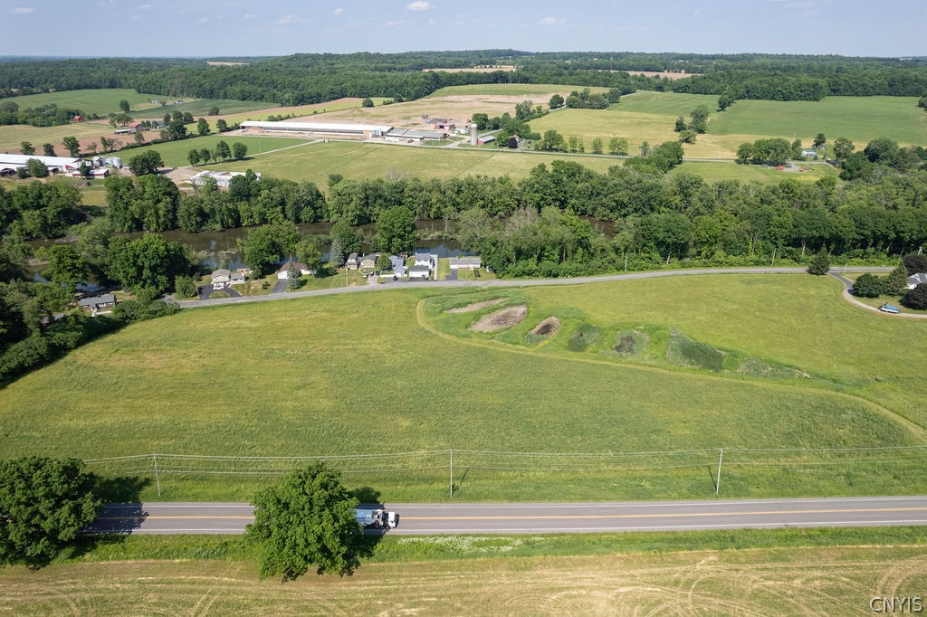 7016 Guyder Road Lysander, NY 13112 - Photo 32 of 41 Expansive farm fields stretch out in front of the