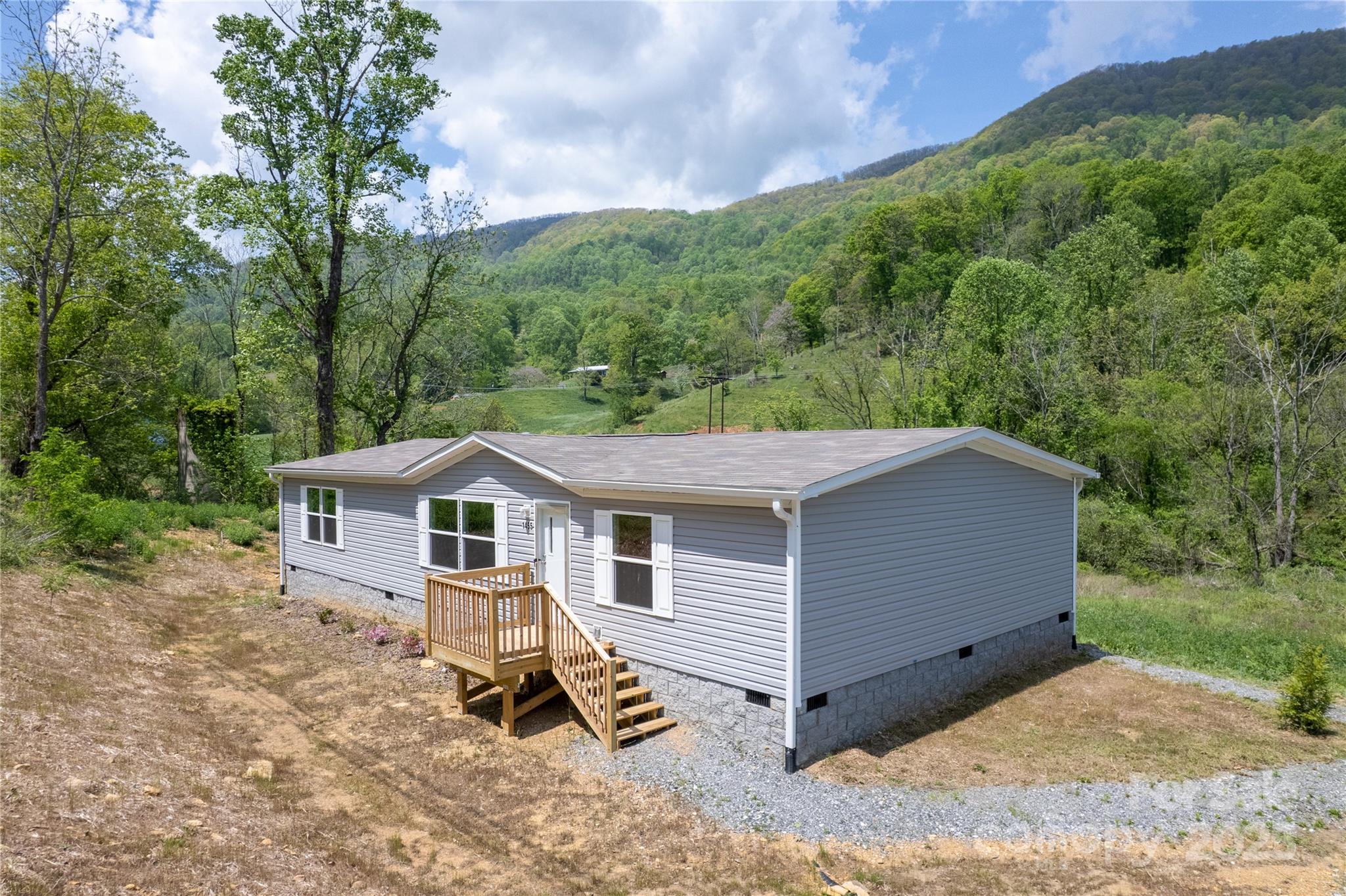 1455 Newfound Road Leicester, NC 28748 - Photo 29 of 47 an aerial view of a house with a yard