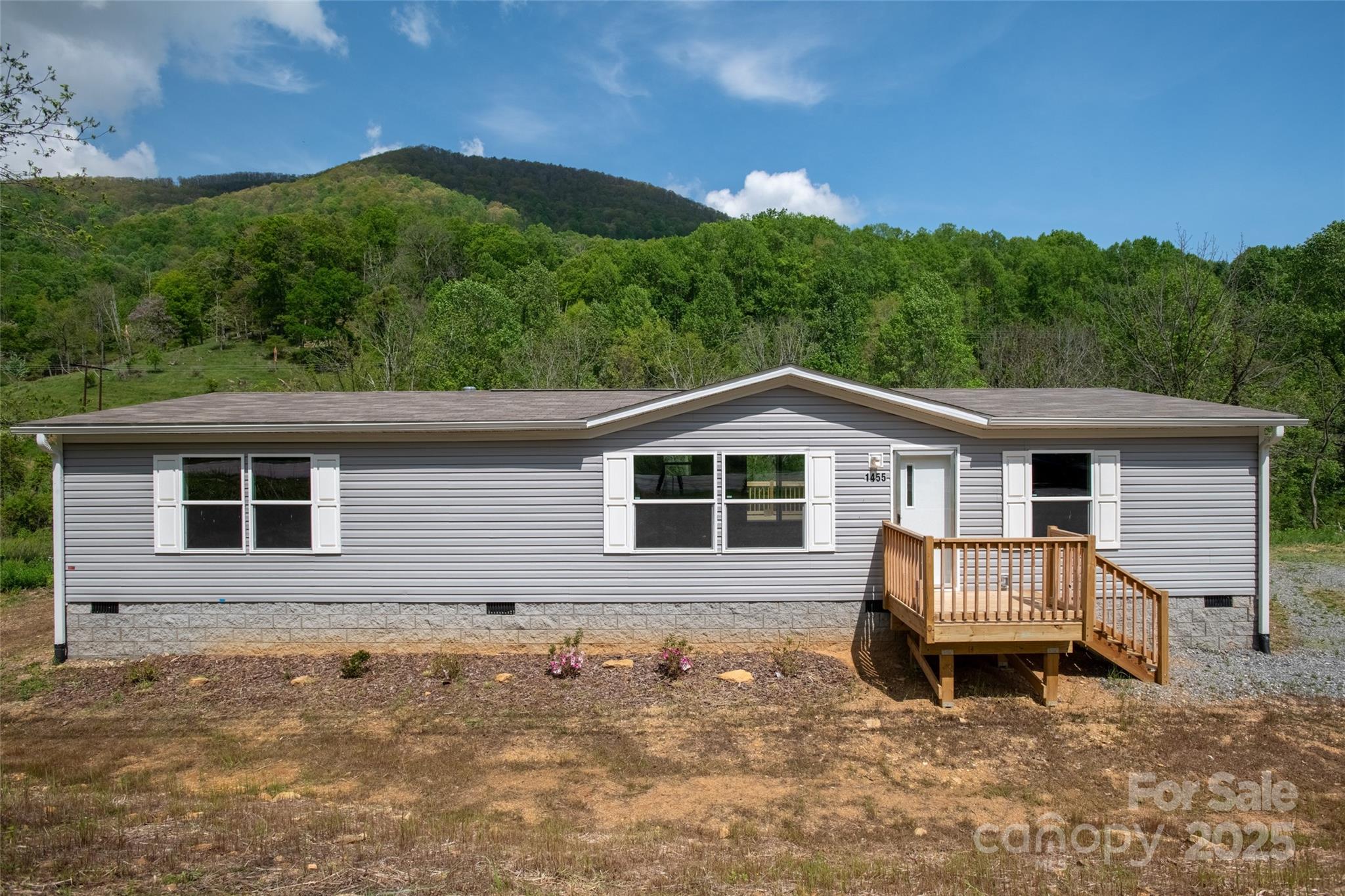 1455 Newfound Road Leicester, NC 28748 - Photo 30 of 47 a front view of a house with a garden