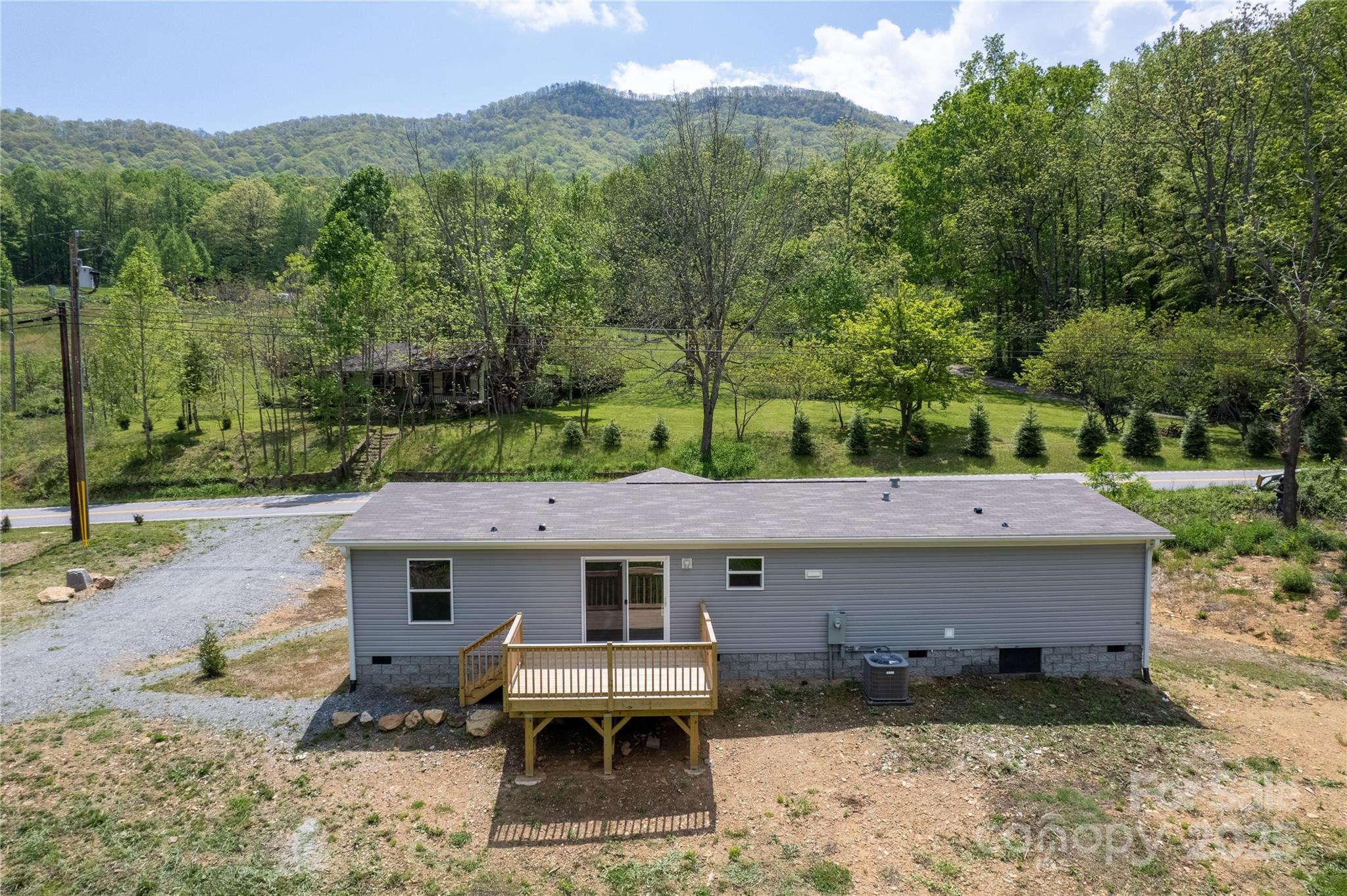1455 Newfound Road Leicester, NC 28748 - Photo 32 of 47 an aerial view of a house with a yard