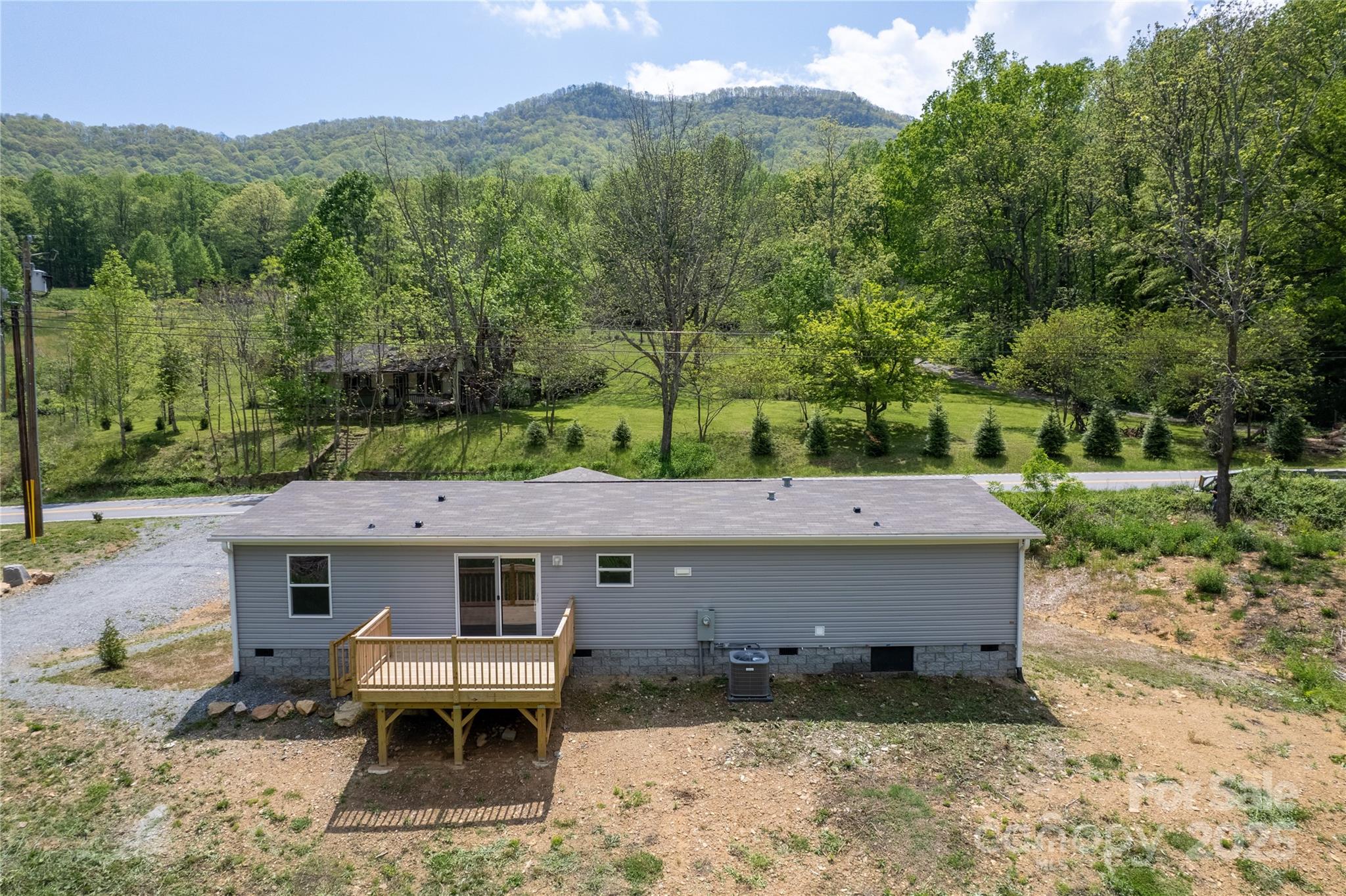 1455 Newfound Road Leicester, NC 28748 - Photo 36 of 47 an aerial view of a house with a yard