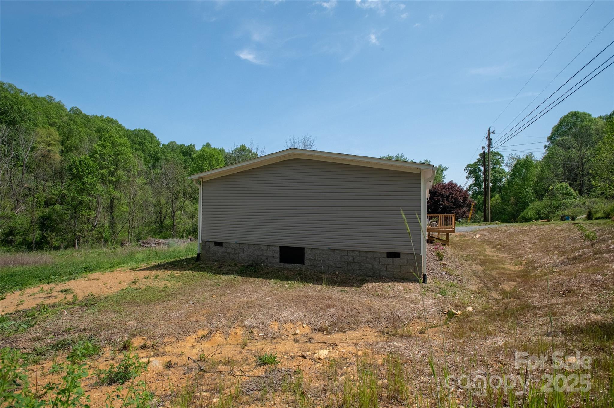1455 Newfound Road Leicester, NC 28748 - Photo 43 of 47 a view of a barn in the middle of a yard