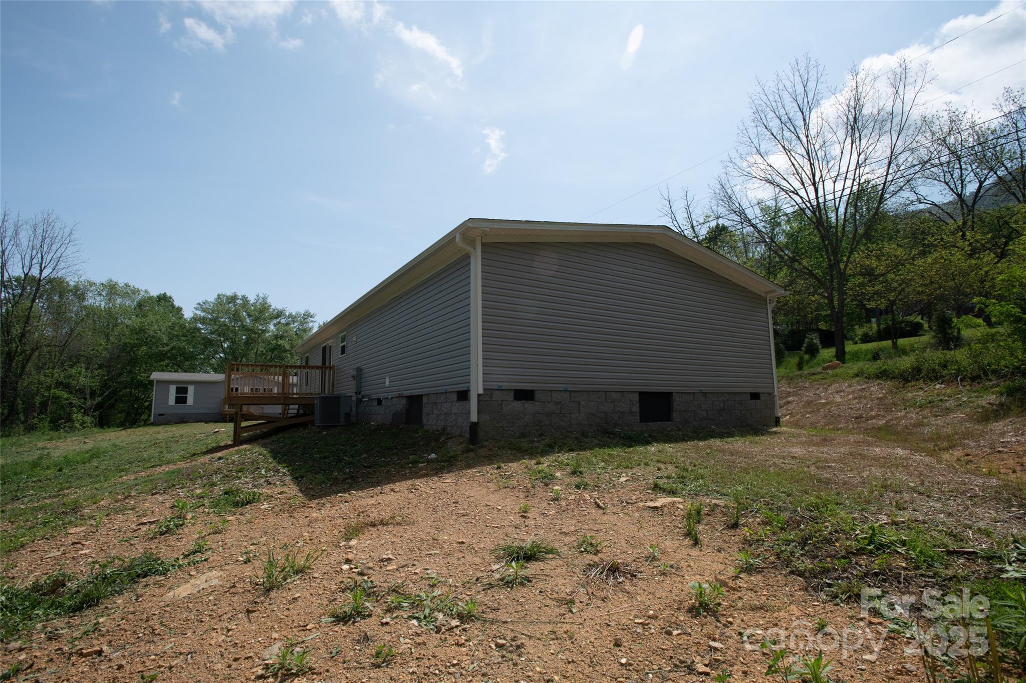 1455 Newfound Road Leicester, NC 28748 - Photo 44 of 47 a backyard of a house with lots of green space