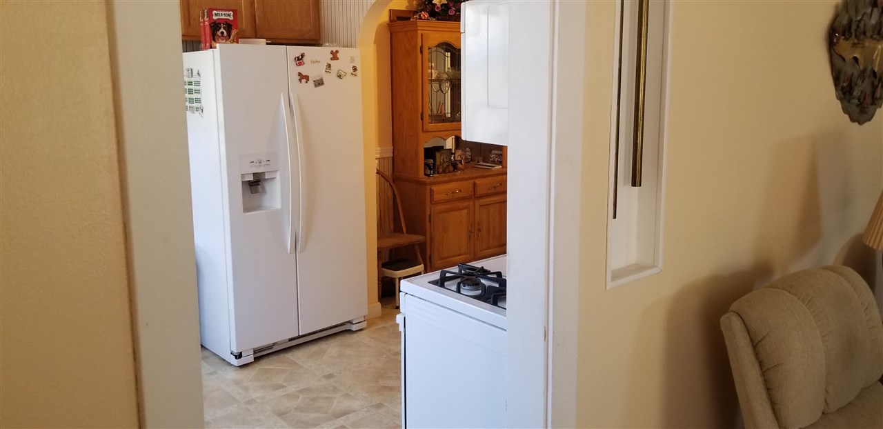 381 Aleut Street Biggs, CA 95917 - Photo 19 of 35 a view of walk in closet with clothes and shoes