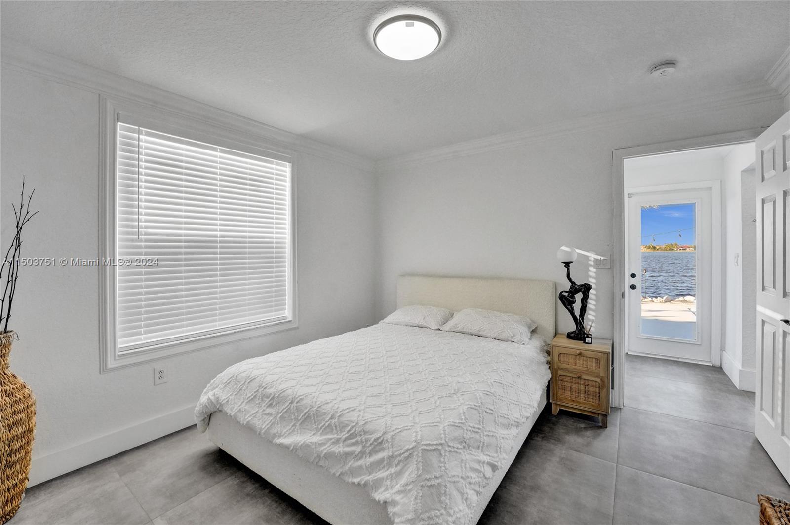 18831 Southwest 24th Street Miramar, FL 33029 - Photo 41 of 96 a bedroom with a bed and a window