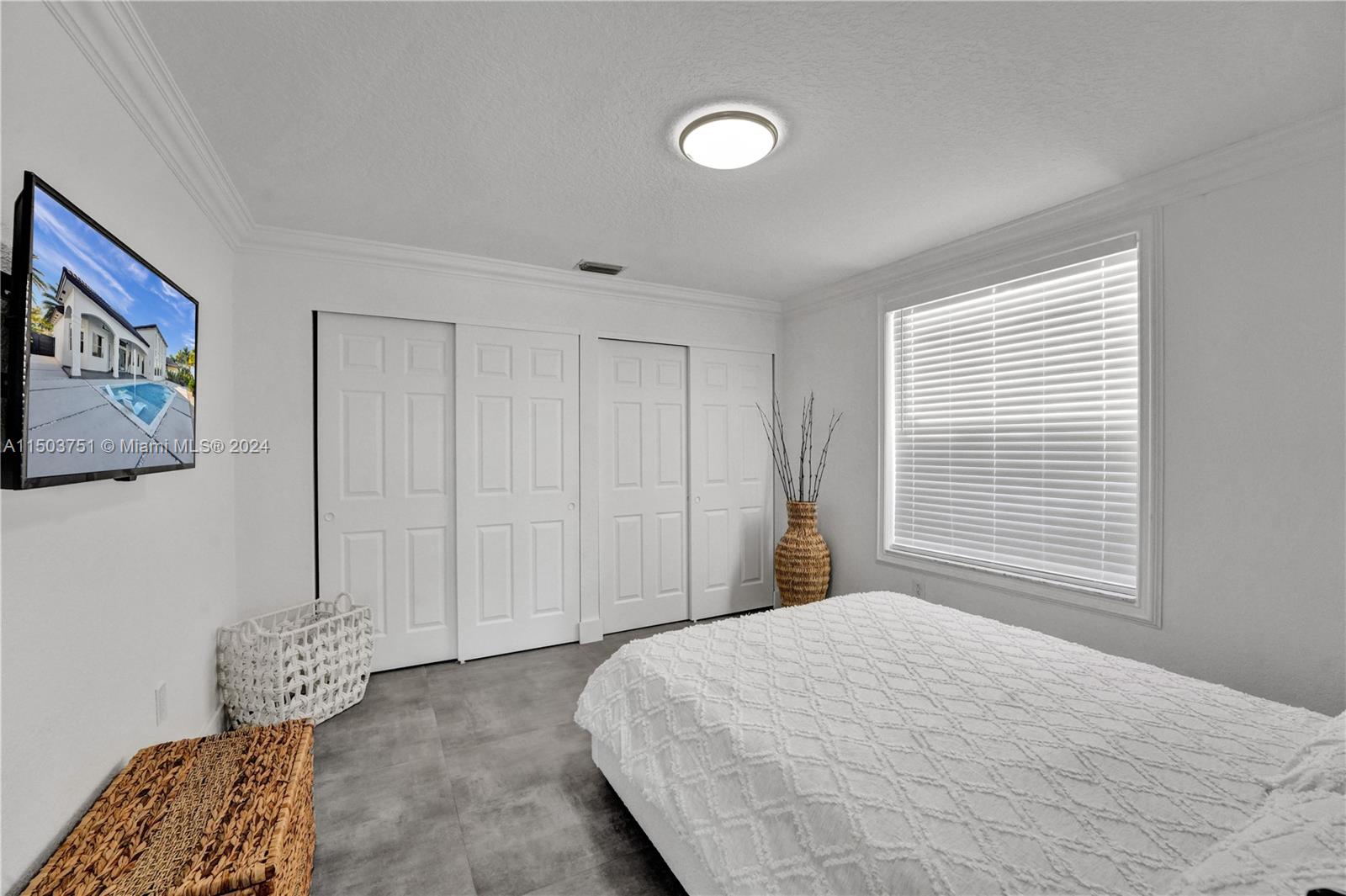 18831 Southwest 24th Street Miramar, FL 33029 - Photo 42 of 96 a bedroom with a bed and a window