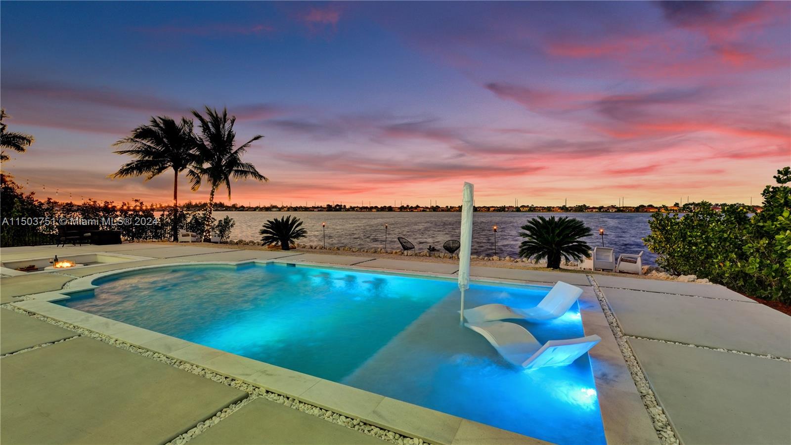 18831 Southwest 24th Street Miramar, FL 33029 - Photo 6 of 96 a view of a swimming pool with an outdoor seating