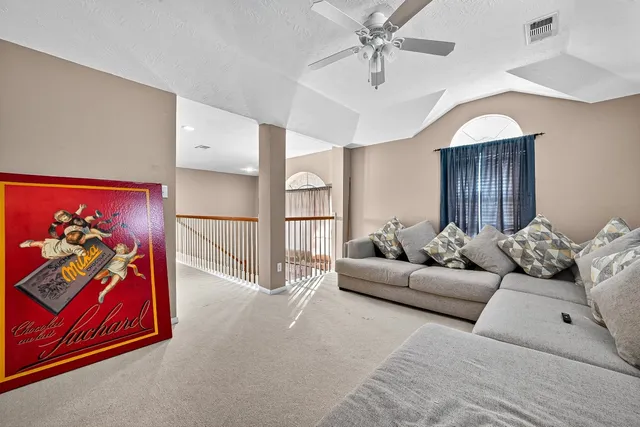 a front view of house with a garden