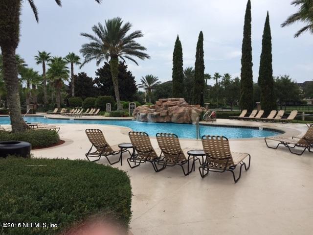 10961 Burnt Mill Road, Unit 222 Jacksonville, FL 32256 - Photo 16 of 20 a view of a lake with outdoor seating space