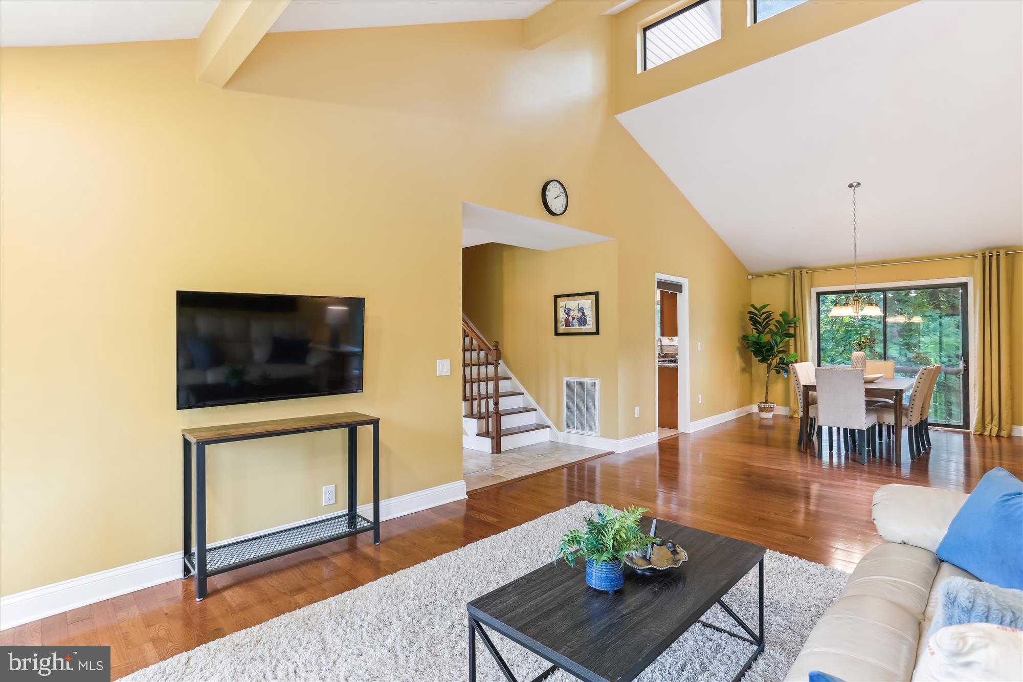 4 Eaglebrook Court Rockville, MD 20854 - Photo 29 of 83 a living room with furniture and a flat screen tv