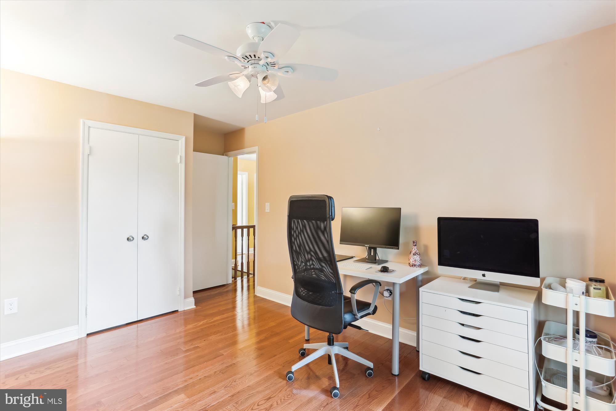 4 Eaglebrook Court Rockville, MD 20854 - Photo 44 of 83 a view of a workspace with furniture and a flat screen tv