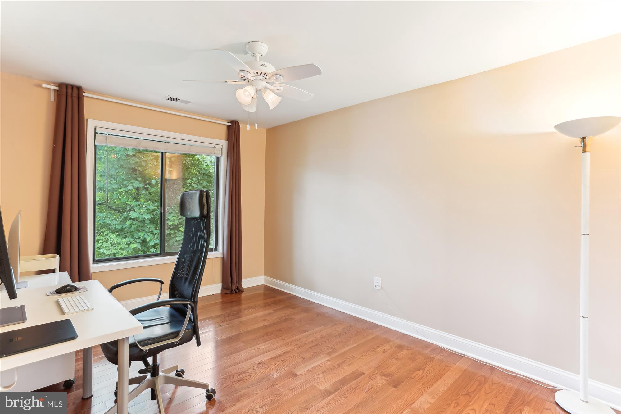 4 Eaglebrook Court Rockville, MD 20854 - Photo 45 of 83 a view of a room with wooden floor and windows