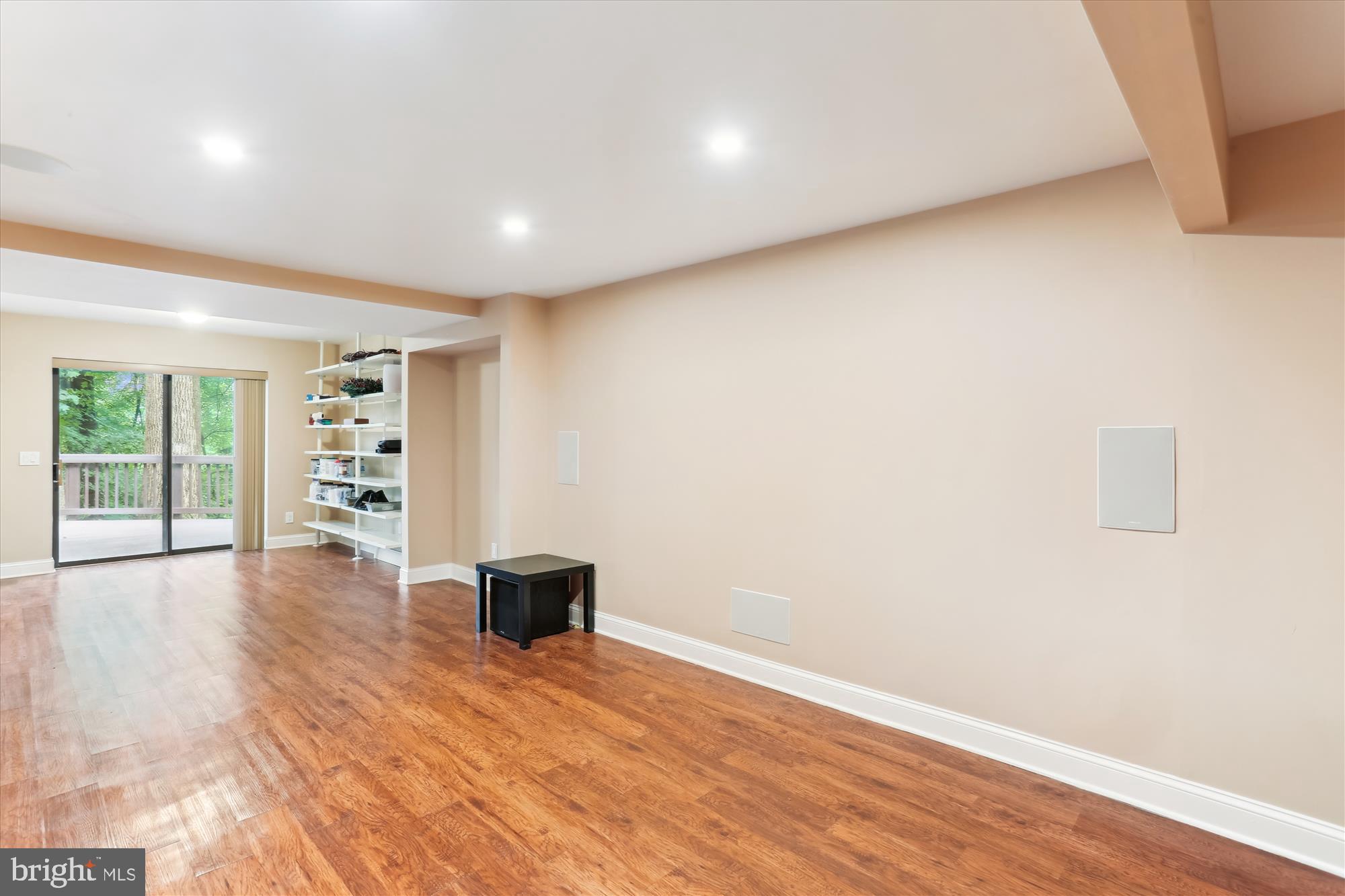 4 Eaglebrook Court Rockville, MD 20854 - Photo 58 of 83 a view of an empty room with a window and wooden floor