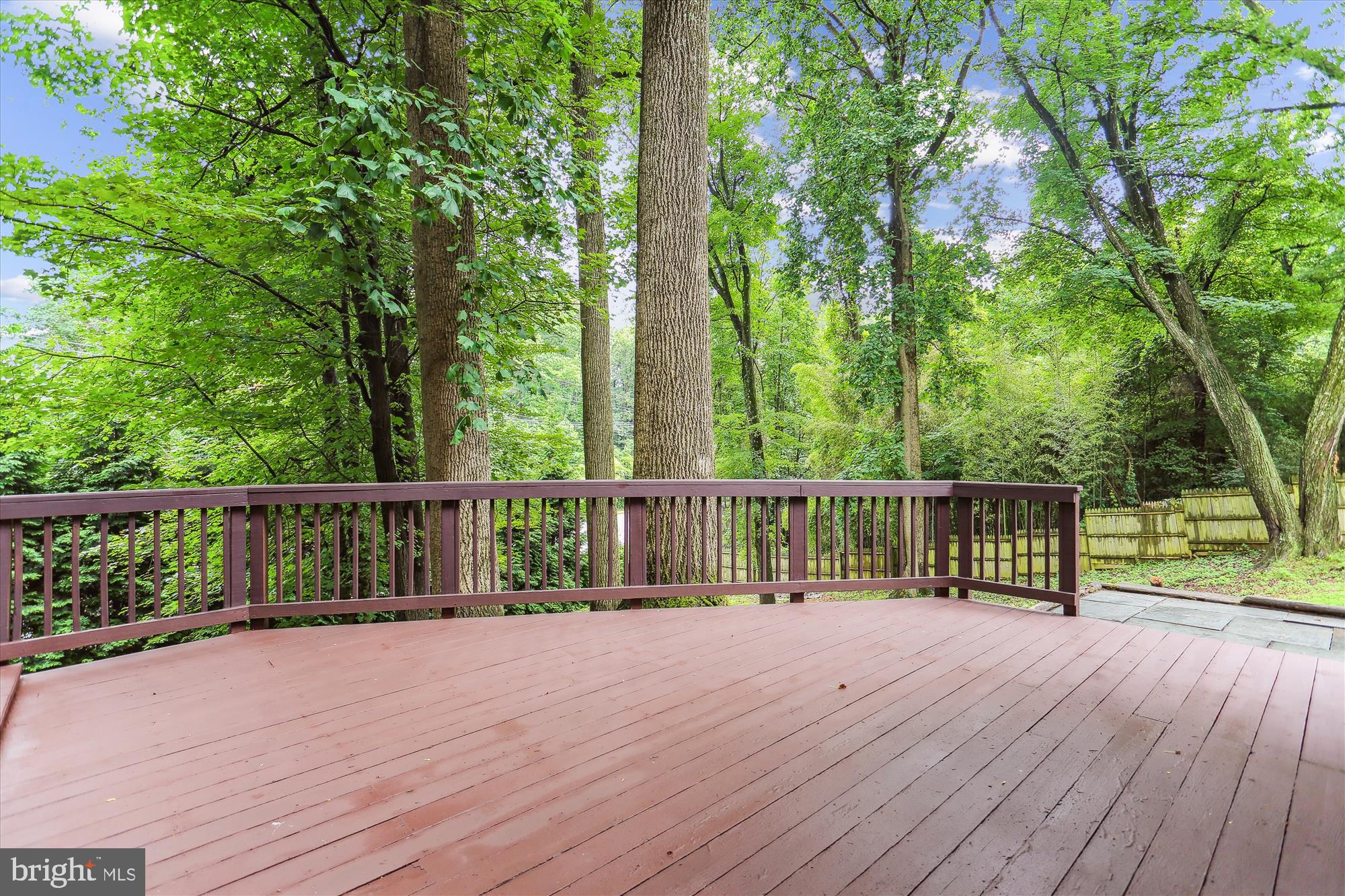 4 Eaglebrook Court Rockville, MD 20854 - Photo 69 of 83 a view of balcony with wooden floor and fence