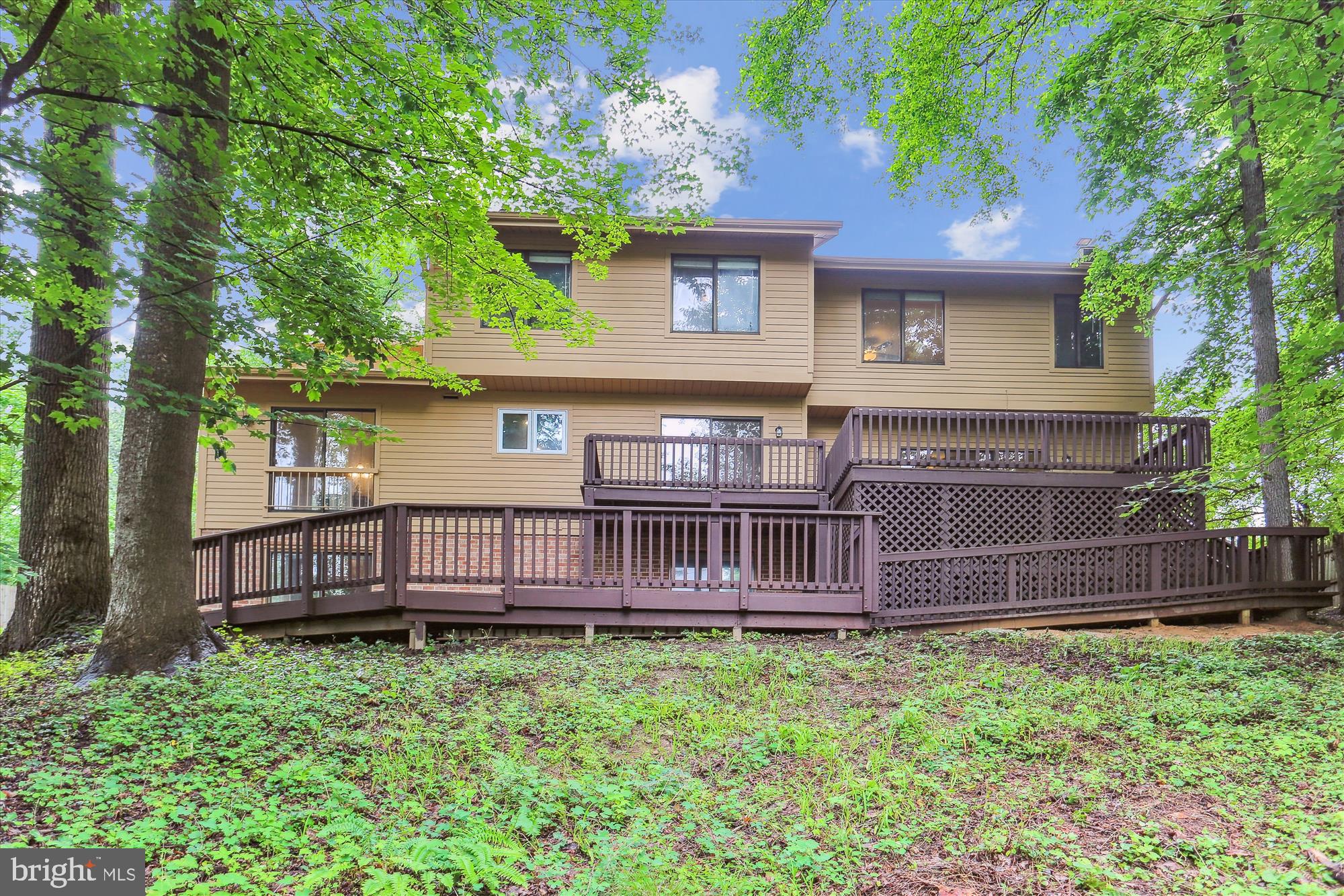 4 Eaglebrook Court Rockville, MD 20854 - Photo 73 of 83 a front view of a house with a garden