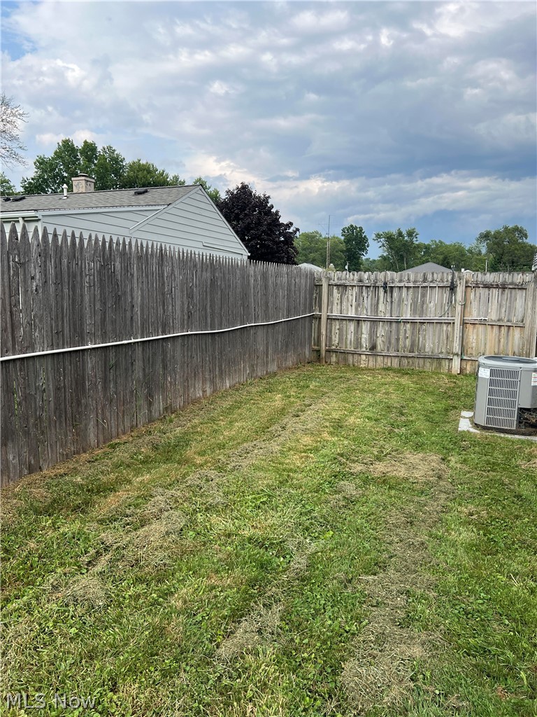 4940 Wake Robin Road Mentor, OH 44060 - Photo 7 of 9 View of yard featuring cooling unit