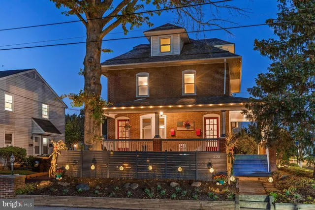 a front view of a building with street view