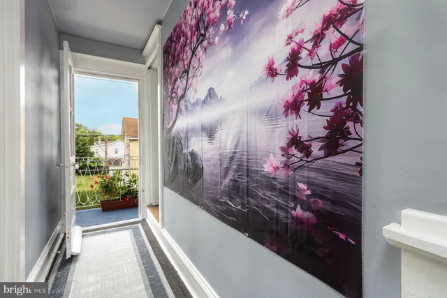 an aerial view of a house with a yard and potted plants
