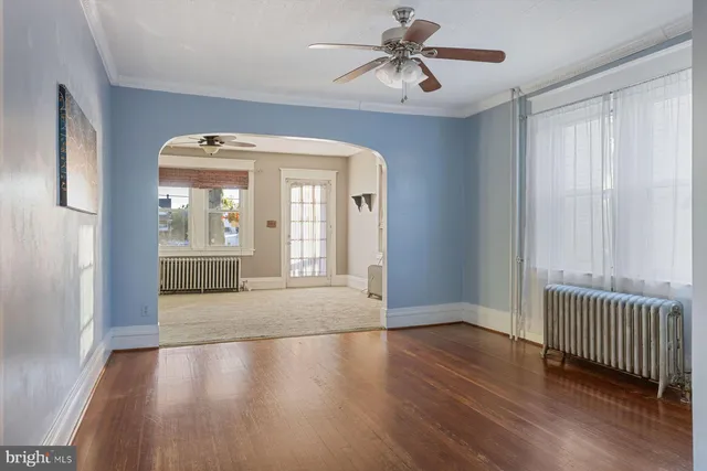 a bathroom with a sink toilet and mirror
