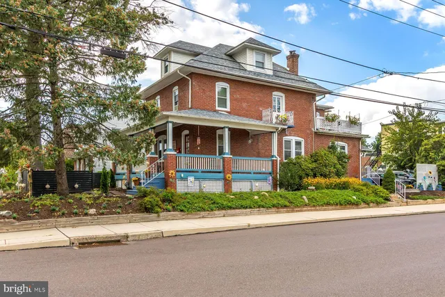 a view of a chairs and table in the patio
