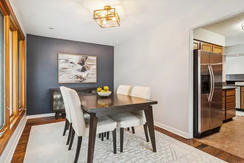 a view of a dining room with furniture