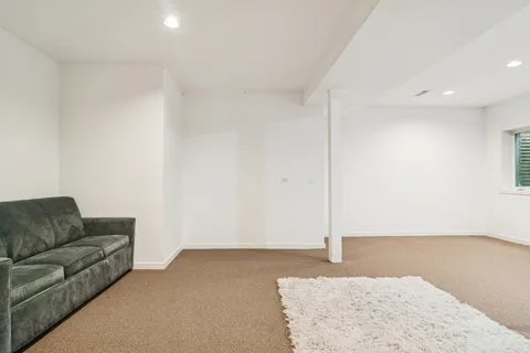 a living room with furniture and a couch
