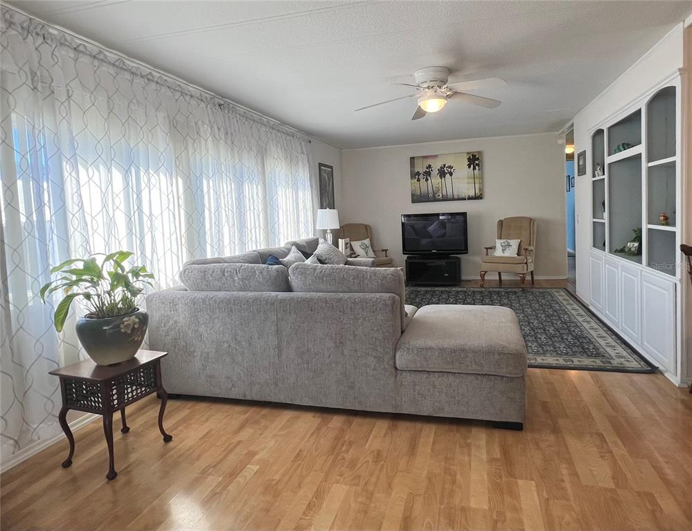 1100 South Belcher Road, Unit 604 Largo, FL 33771 - Photo 13 of 64 a living room with furniture and a fireplace