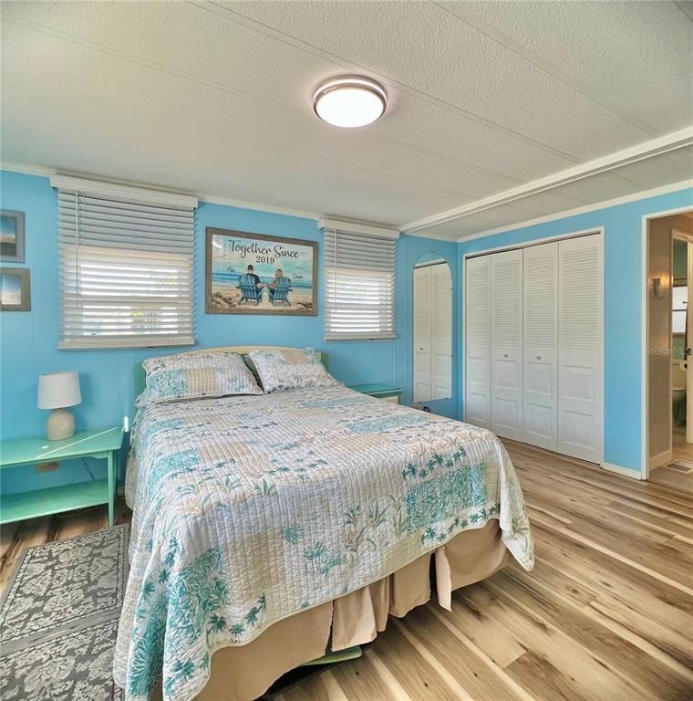 1100 South Belcher Road, Unit 604 Largo, FL 33771 - Photo 23 of 64 a bedroom with a large bed and a window