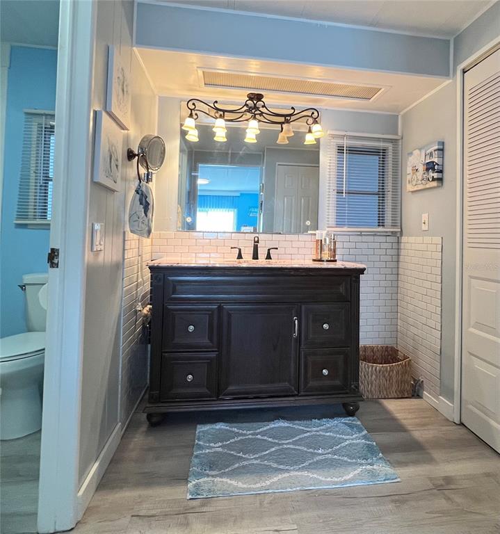 1100 South Belcher Road, Unit 604 Largo, FL 33771 - Photo 31 of 64 a bathroom with a sink and a mirror