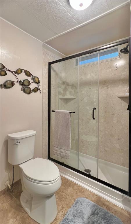 1100 South Belcher Road, Unit 604 Largo, FL 33771 - Photo 34 of 64 a bathroom with a toilet and a shower