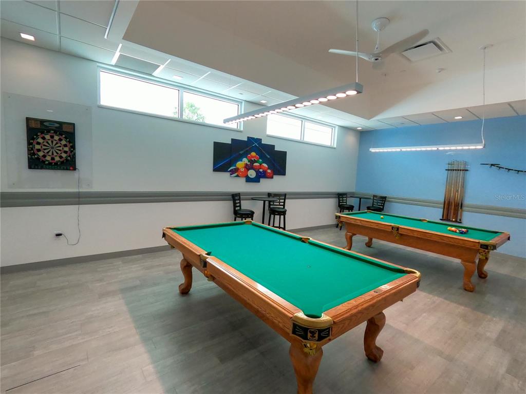 1100 South Belcher Road, Unit 604 Largo, FL 33771 - Photo 50 of 64 a room with pool table and windows