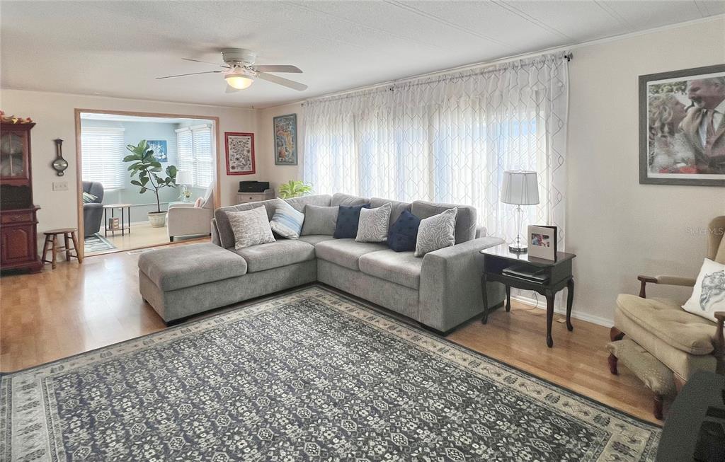 1100 South Belcher Road, Unit 604 Largo, FL 33771 - Photo 10 of 64 a living room with furniture and a couch