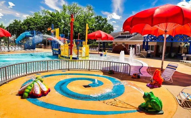 a view of swimming pool with a patio