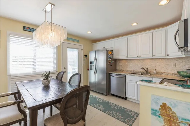 $510,000 | 95 Springville Road, Unit 8, Hampton Bays, NY 11946