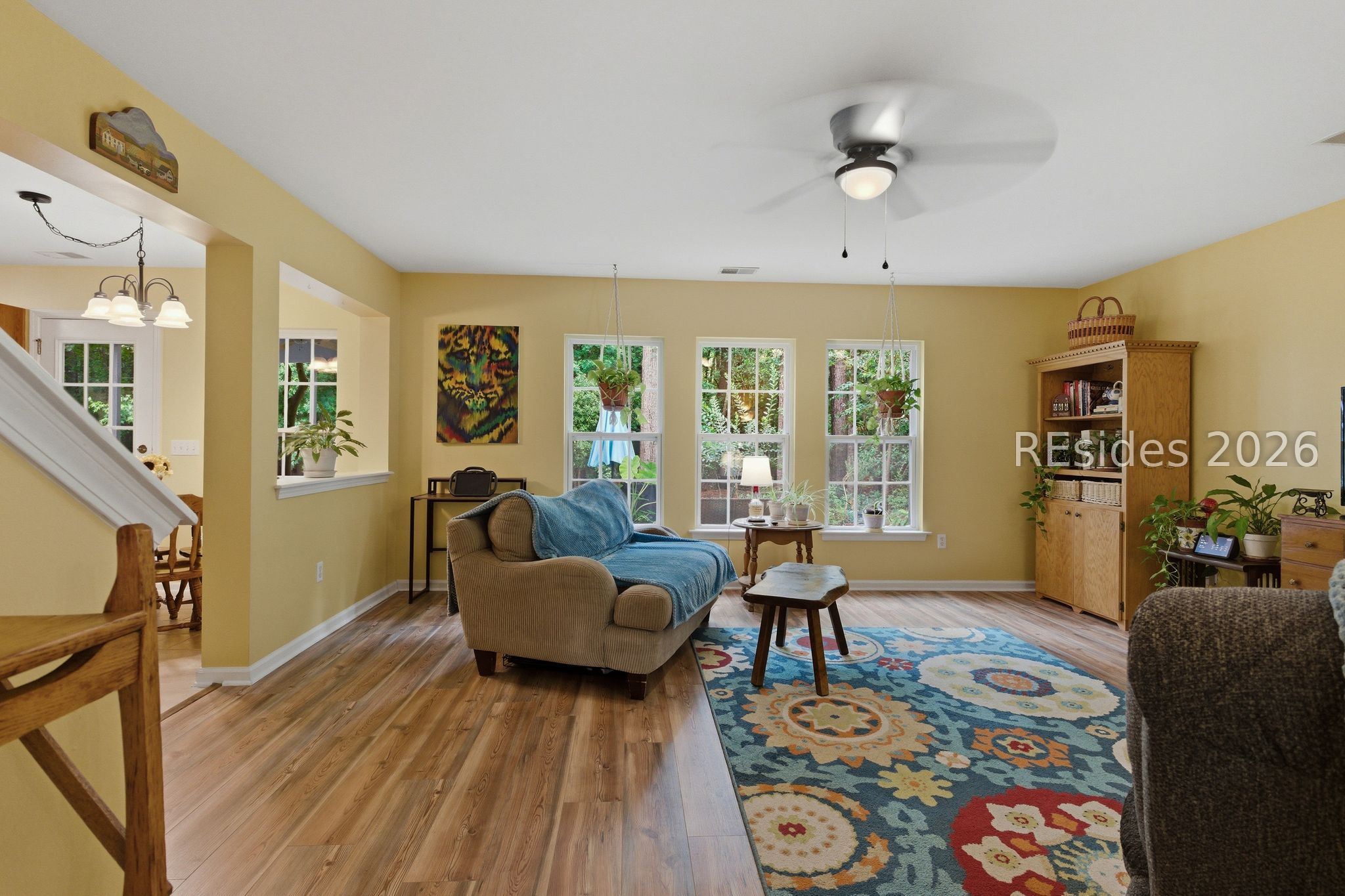 6 Hemlock Court Bluffton, SC 29910 - Photo 12 of 45 Bright family room overlooking the green garden.
