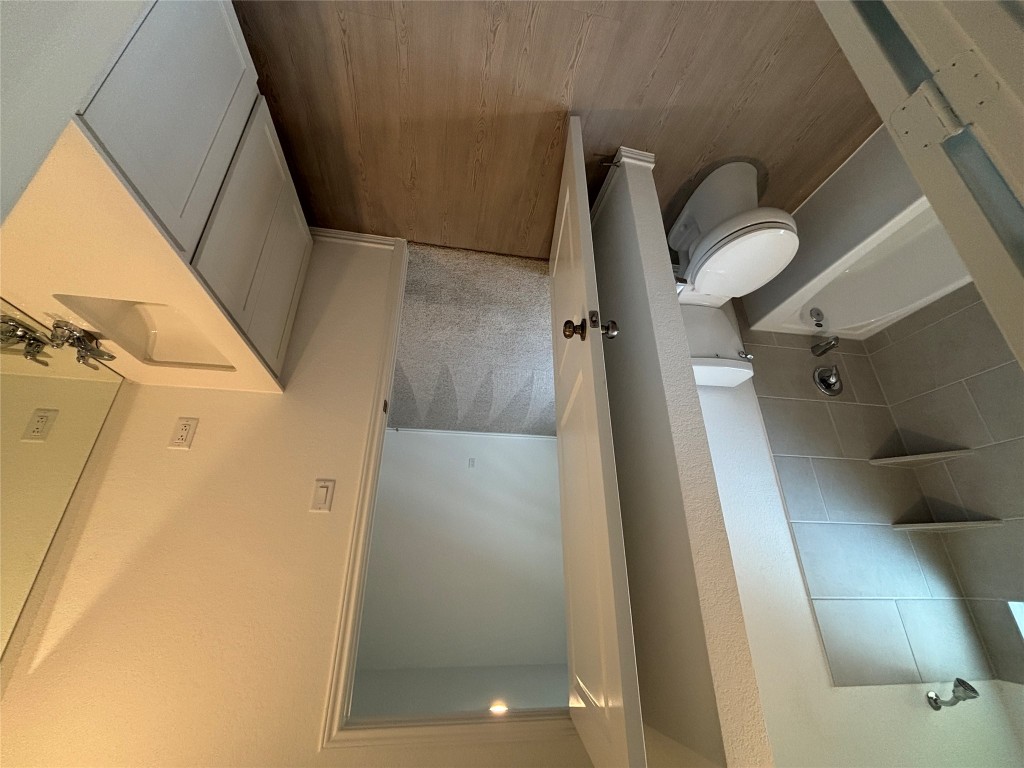 3262 Everett Kyle, TX 78640 - Photo 14 of 24 a bathroom with a sink a toilet and tub