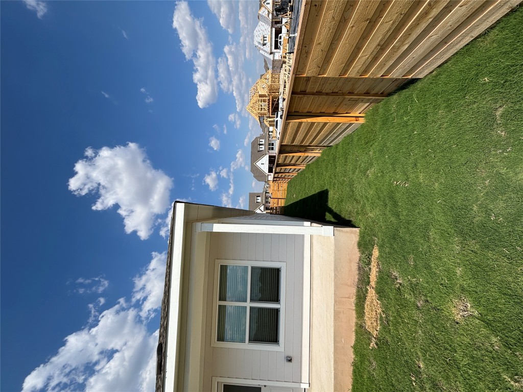 3262 Everett Kyle, TX 78640 - Photo 20 of 24 a view of a house with a backyard