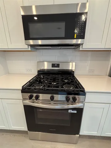 a utility room with washer and dryer