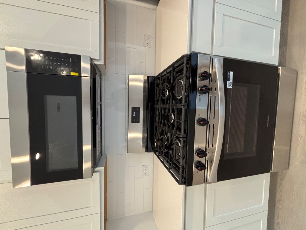 3262 Everett Kyle, TX 78640 - Photo 8 of 24 a stove top oven sitting inside of a kitchen
