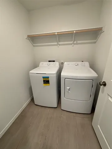 a stove top oven sitting inside of a kitchen