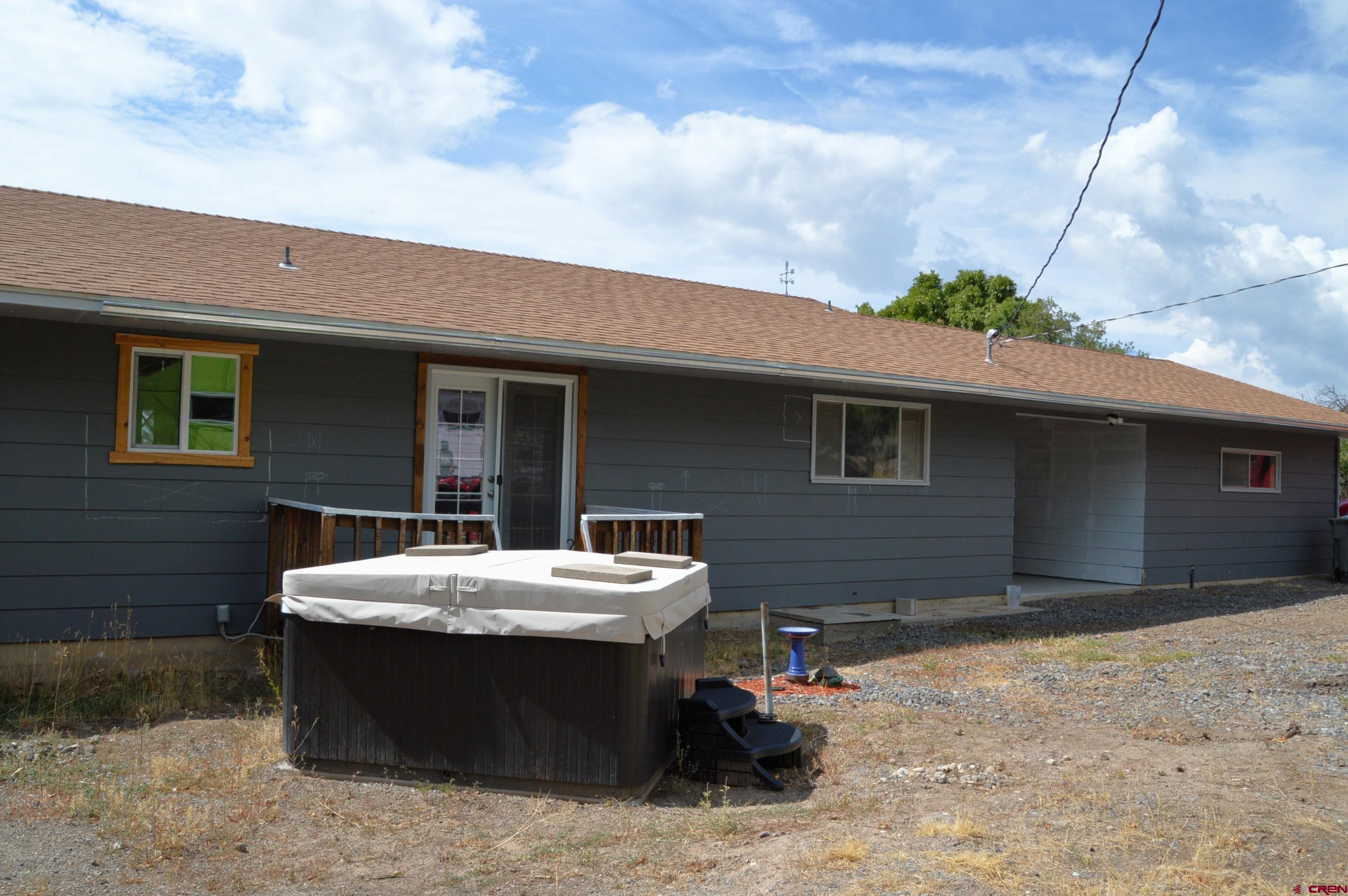 22755 Uintah Road Cedaredge, CO 81413 - Photo 16 of 21 a view of a dinning table and chair in the patio